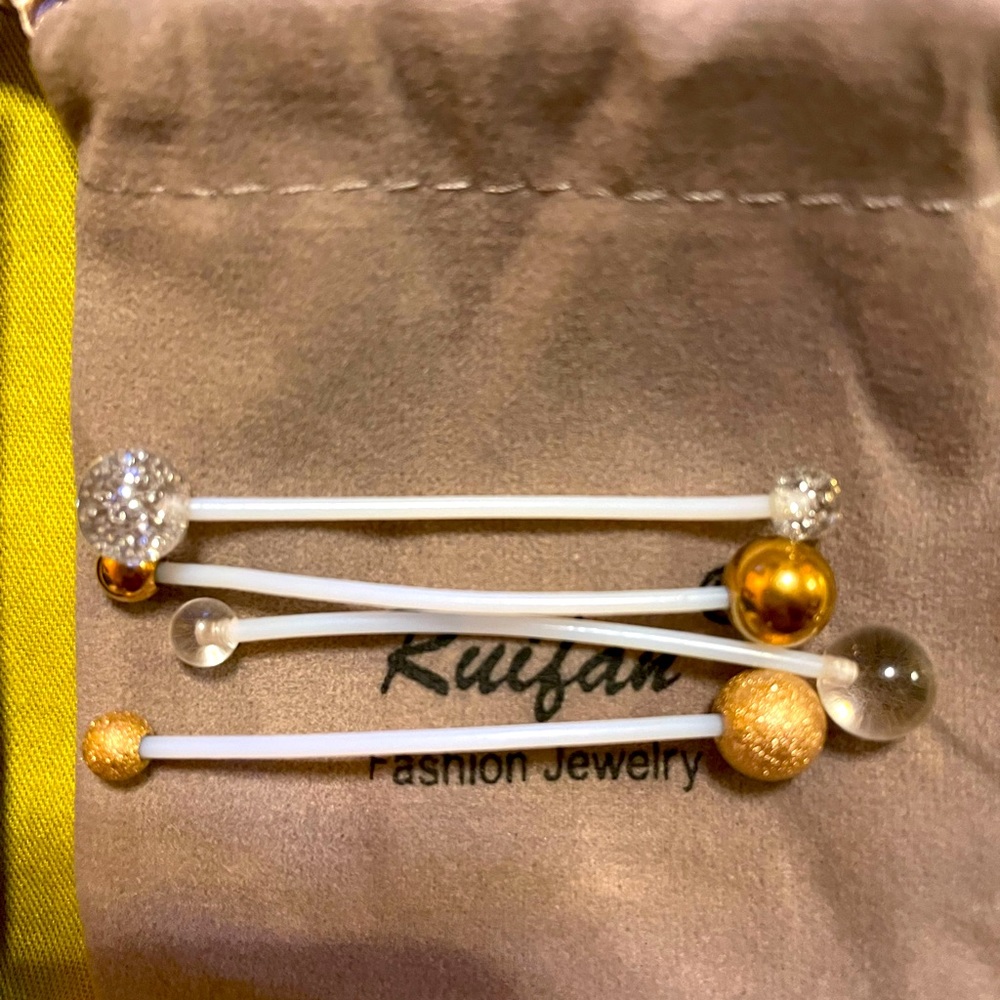 Belly Jewelry. 4 pc. New and very comfortable.